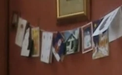 Christmas cards hung up. (:  [+]Russell T Davies, Doctor Who Christmas special (BBC One, 2005)