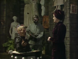 Davros confronts Kara.