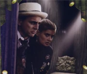 The Seventh Doctor and Ace arrive.