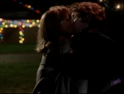 The Doctor kisses . (:  [+]Matthew Jacobs, Doctor Who Television Movie (Fox Broadcasting Company, 1996)