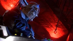 Davros unclasps his leather jacket.