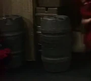 Old barrels with the remnants of the Weyland-Yutani logo