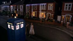 The Tenth Doctor and Donna exit the TARDIS outside her home.