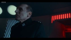 Davros enters the chamber.