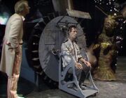 The  and the  watch as  is fitted to the excavation machine