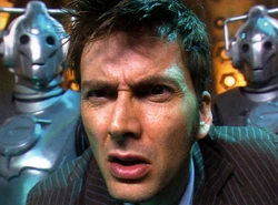 Cybermen appear behind the Doctor in the TARDIS in a deleted scene from Journey's End.