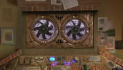 The ventilation system hidden behind Mr Smith. (:  [+]Rupert Laight, The Sarah Jane Adventures series 3 (BBC One, 2009)