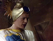 LonCroppedBetter.jpg (23 KB) Here we have the image with the minimal acceptable cropping. All that's been done is that the black bars have been removed