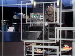 Inside the Daleks' ship, Davros demands immediate transportation out of Skaro.