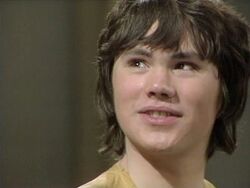 Adric smiling