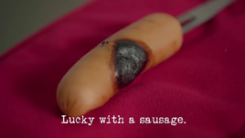 Lucky with a sausage.