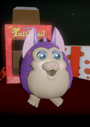 Tattletail as he appeared out of the toy box in-game before the Gift update. Note the white lines around his nose.