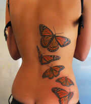 Butterfly tattoo finished by Magicmufinelf