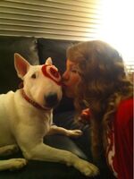 Taylor with Bullseye the dog, the Target mascot