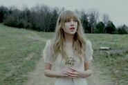 Taylor in her Safe and Sound music video