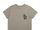 Green pocket tour tee with snake design