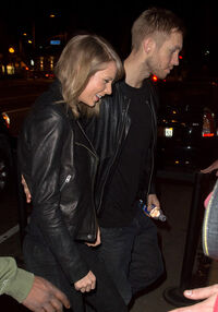 551ef82bfa699a350cfde970 taylor-swift-calvin-harris-matching-outfits