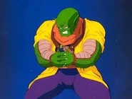 Lord Slug crushing Piccolo.