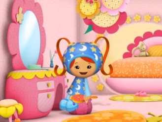 Stars and moons dress from The Milk Out, she wears this when she goes to bed