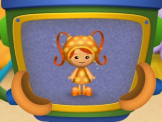 Orange with yellow suns dress from The Kite Festival