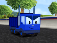 Dump truck racing ahead