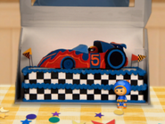 Geo with car cake