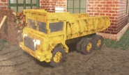 The dump truck located at the players' base.