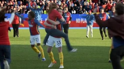 Ander's girlfriend jumps and hugs him after the match