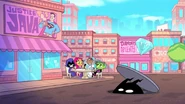 The Demon peering out of a manhole.