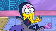 Red X tries to eat a pizza without removing his mask.