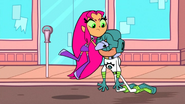 Starfire beats up See-More.