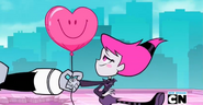 Cyborg giving Jinx a heart shaped balloon.