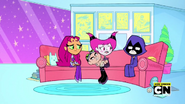 Starfire and Raven come to cheer Jynx as she cuddles Gizmo