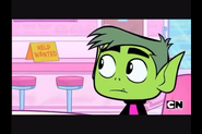 Beast Boy notices the "Help Wanted" sign.