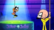 Batgirl winces in fear of the Joker Jelly