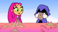 Starfire sees Raven with her mouth stuffed with hot dogs.