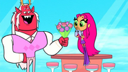 Trigon gives Starfire a bouquet of flowers...