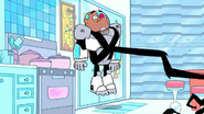 ...and throws Cyborg against the fridge.