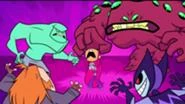 Killer Croc and other villains about to hurt Starfire in Robin's dream.
