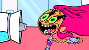 Cyborg gives Starfire a bad hair day.