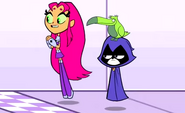 Starfire joins Raven and Beast Boy at the finish line.