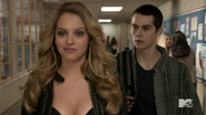 2x07 Erica and Stiles in the hallway