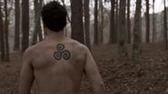 1x05 Symbols triskelion tattoo