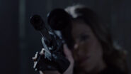 1x08 Kate with a rifle