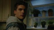 6x07 Theo at window.jpg (25 KB)