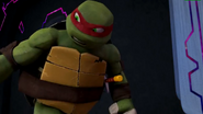 Raph pushing Donnie away