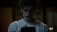 Teen Wolf Season 2 Episode 6 Motel California Daniel Sharman Isaac watches static 