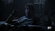 Teen Wolf Season 4 Episode 11 A Promise to the Dead Scott tied with straps and wolfsbane
