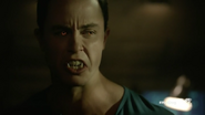 Teen Wolf Season 5 Episode 14 The Sword and the Spirit Parrish's eyes and fangs