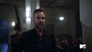 JR-Bourne-Chris-Argent-with-gun-Teen-Wolf-Season-6-Episode-10-Riders-on-the-Storm